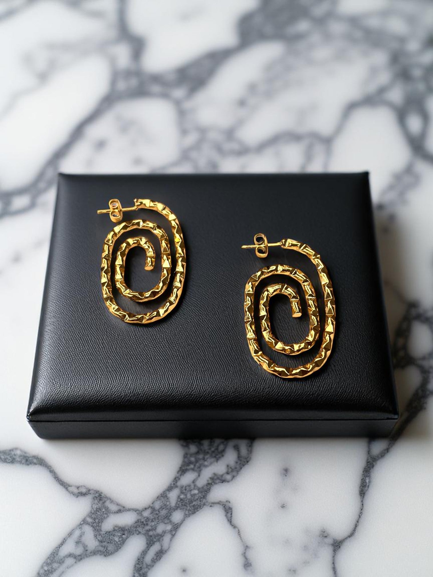 Boucle d'oreille 1